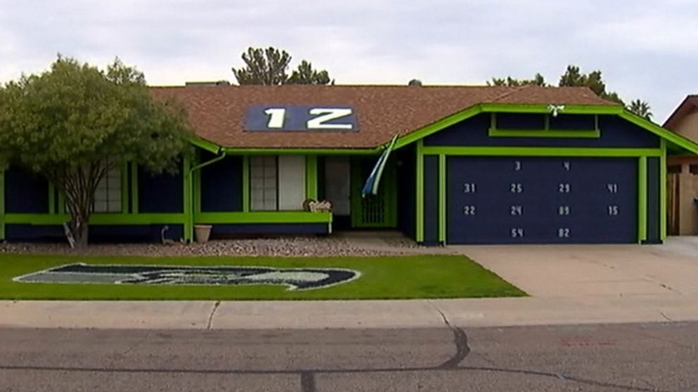 PHOTO: A Seahawks fan painted this home and lawn in Arizona in time for the Super Bowl game in Phoenix on Sunday, Feb. 1. 