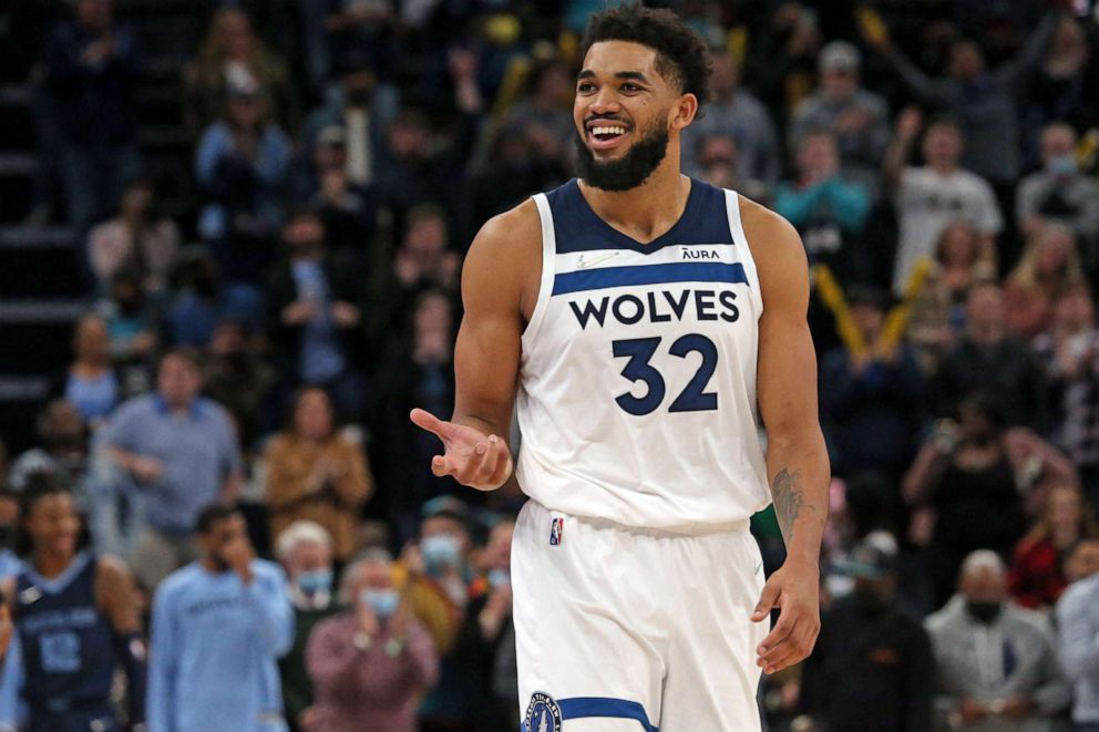 PHOTO: Jan 13, 2022; Memphis, Tennessee, USA; Minnesota Timberwolves center/forward Karl-Anthony Towns (32) reacts to a foul call during the second half against the Memphis Grizzles at FedExForum. 