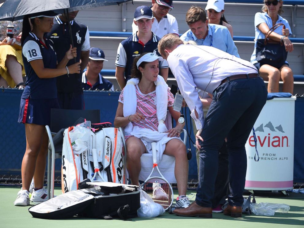 PHOTO: Alize Cornet sits during a break in her first round at the 2018 US Open at Billie Jean National Tennis Center in New York, Aug. 28, 2018.