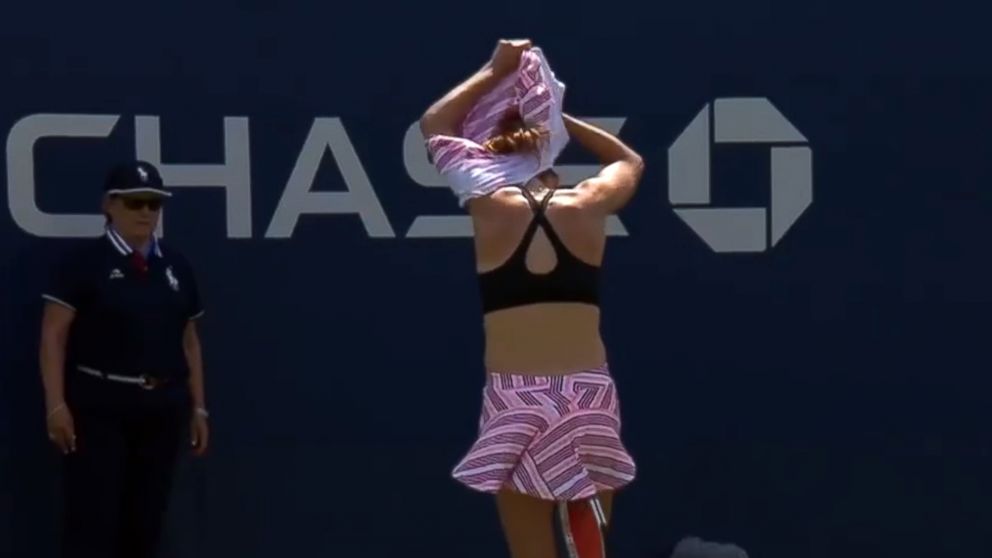 PHOTO: Alize Cornet of France removed her top briefly during her first round at the 2018 US Open in New York, Aug. 28, 2018.