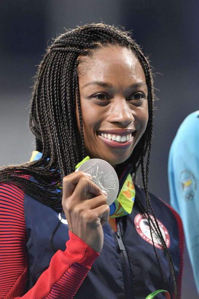 PHOTO: Silver medalist USA's Allyson Felix poses on the podium for the Women's 400 meter during the athletics at the Rio 2016 Olympic Games at the Olympic Stadium in Rio de Janeiro on Aug. 16, 2016. 