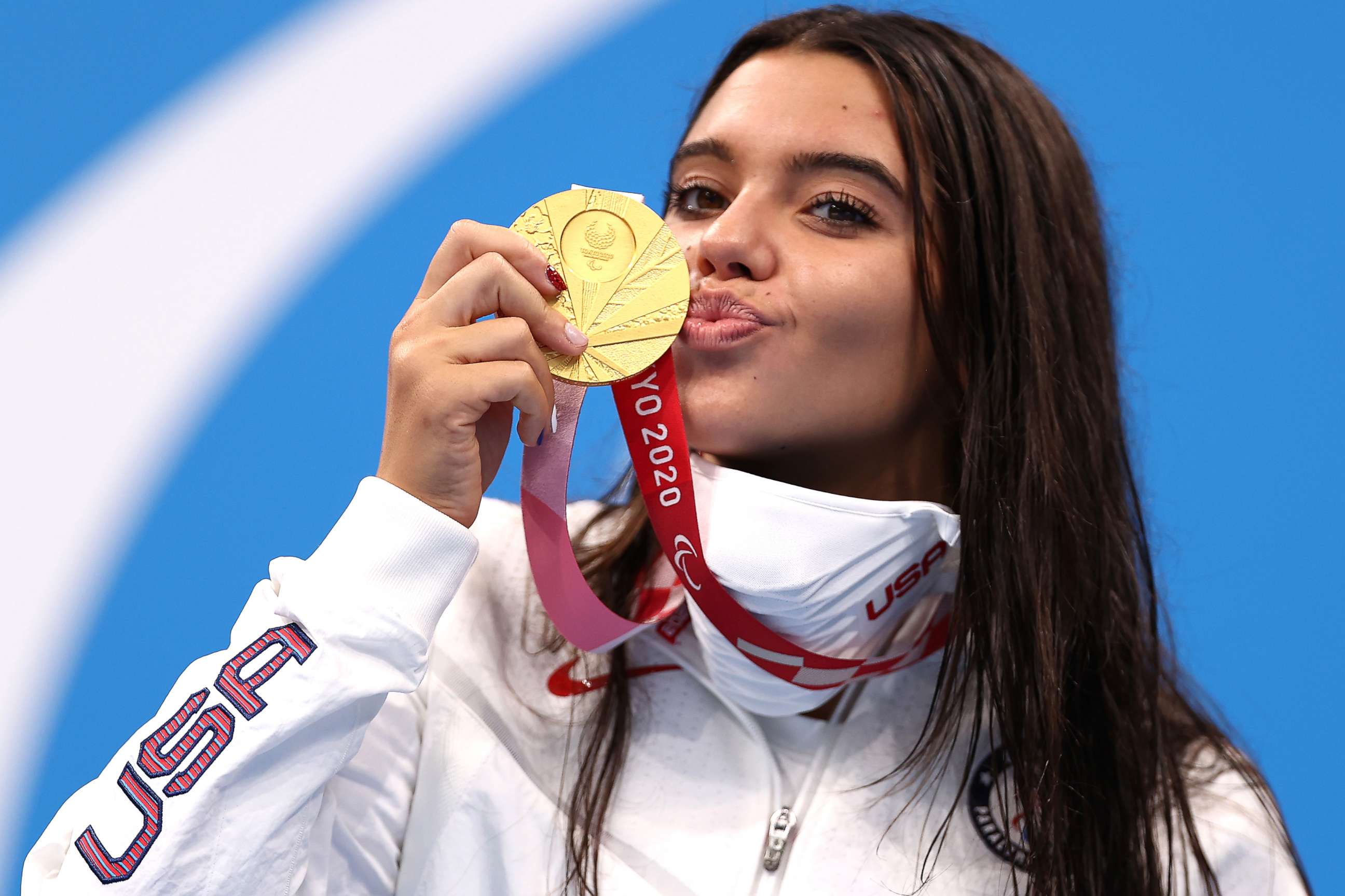 PHOTO: Gold medalist Anastasia Pagonis of Team USA reacts during the women's 400-meter freestyle S11 medal ceremony on day 2 of the Tokyo 2020 Paralympic Games at the Tokyo Aquatics Centre on Aug. 26, 2021, in Tokyo.