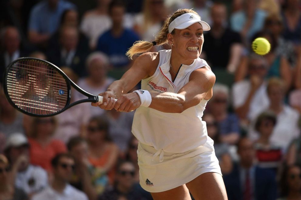 PHOTO: Germany's Angelique Kerber returns the ball to U.S. player Serena Williams during their women's singles final match on the day 12 of the 2018 Wimbledon Championships at All England Lawn Tennis Club in London, July 14, 2018.