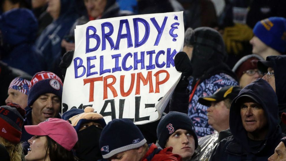 PHOTO: A New England Patriots fan holds a sign referring to Patriots quarterback Tom Brady, head coach Bill Belichick and President Donald Trump during the first half of the AFC championship NFL football game in Foxborough, Massachusetts, Jan. 22, 2017. 