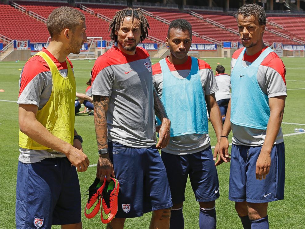 PHOTO: German-American players on the U.S. World Cup team, Fabian Johnson, Jermaine Jones, Julian Green, and Timothy Chandler meet after a practice in Stanford, Calif. on May 22, 2014.