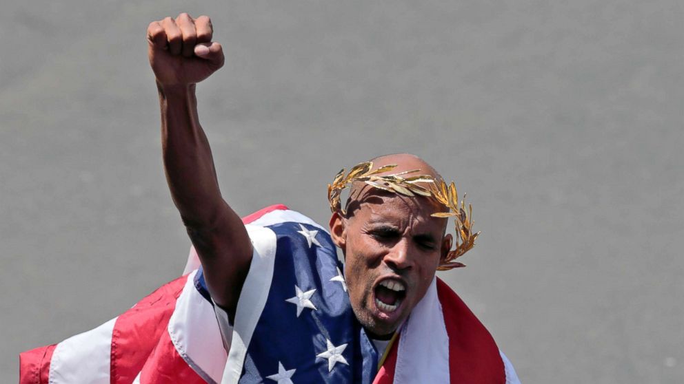 PHOTO: Meb Keflezighi, of San Diego, Calif., celebrates his victory in the 118th Boston Marathon, April 21, 2014 in Boston. 