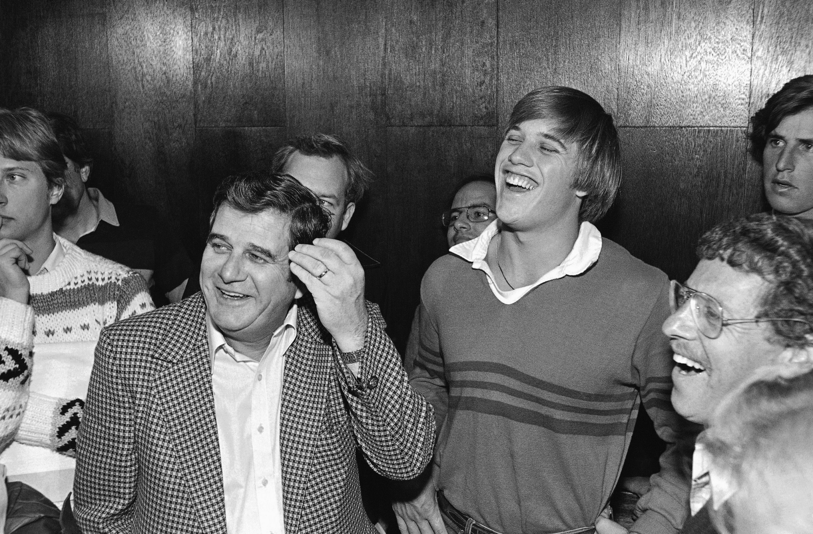 PHOTO: Stanford University quarterback John Elway, right, laughs with his father Jack Elway during a press conference in afternoon on Tuesday, April 26, 1983 in San Jose, Calif.
