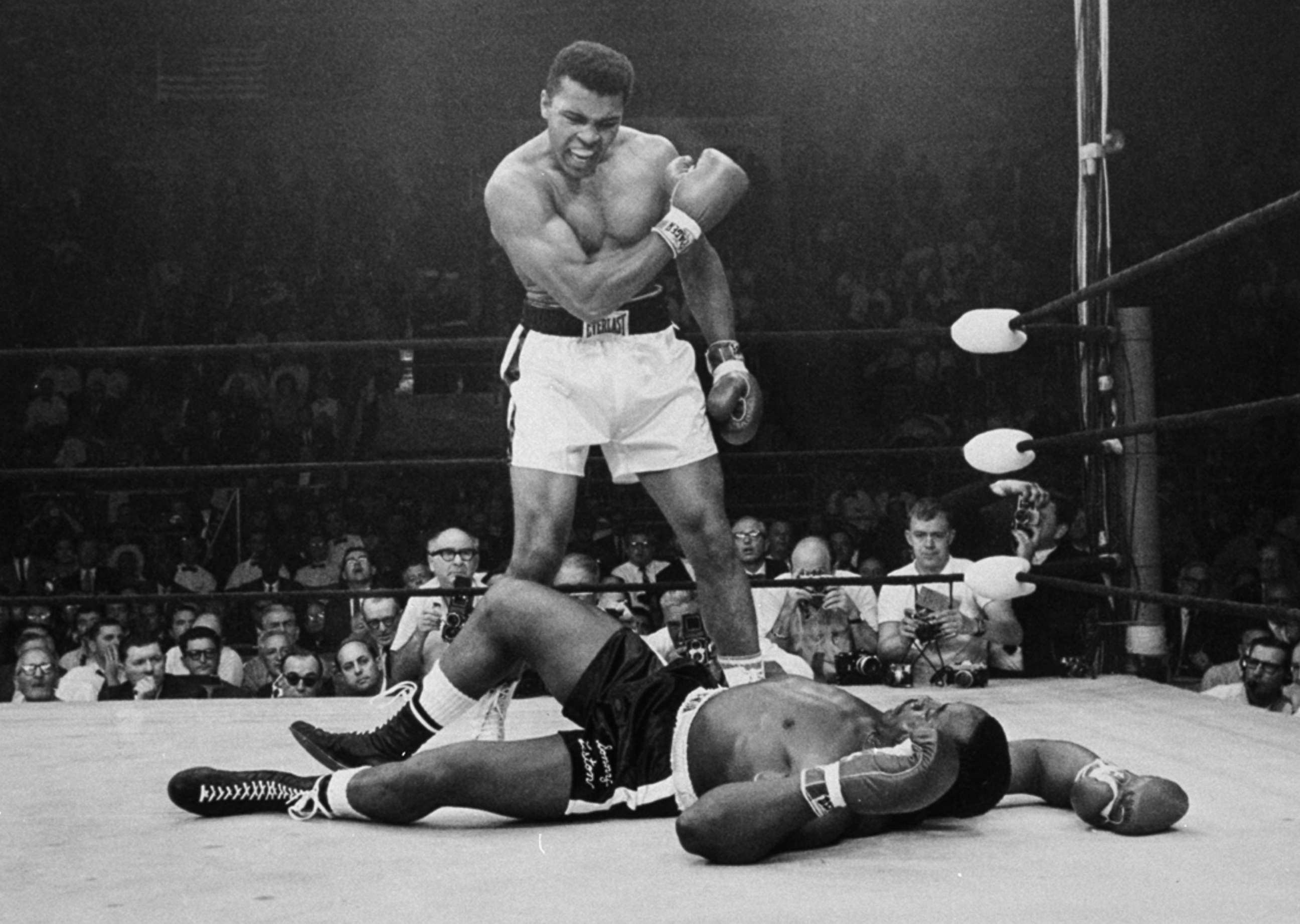 PHOTO: Heavyweight champion Muhammad Ali stands over fallen challenger Sonny Liston, shouting and gesturing shortly after dropping Liston with a short hard right to the jaw in Lewiston, Maine, May 25, 1965.