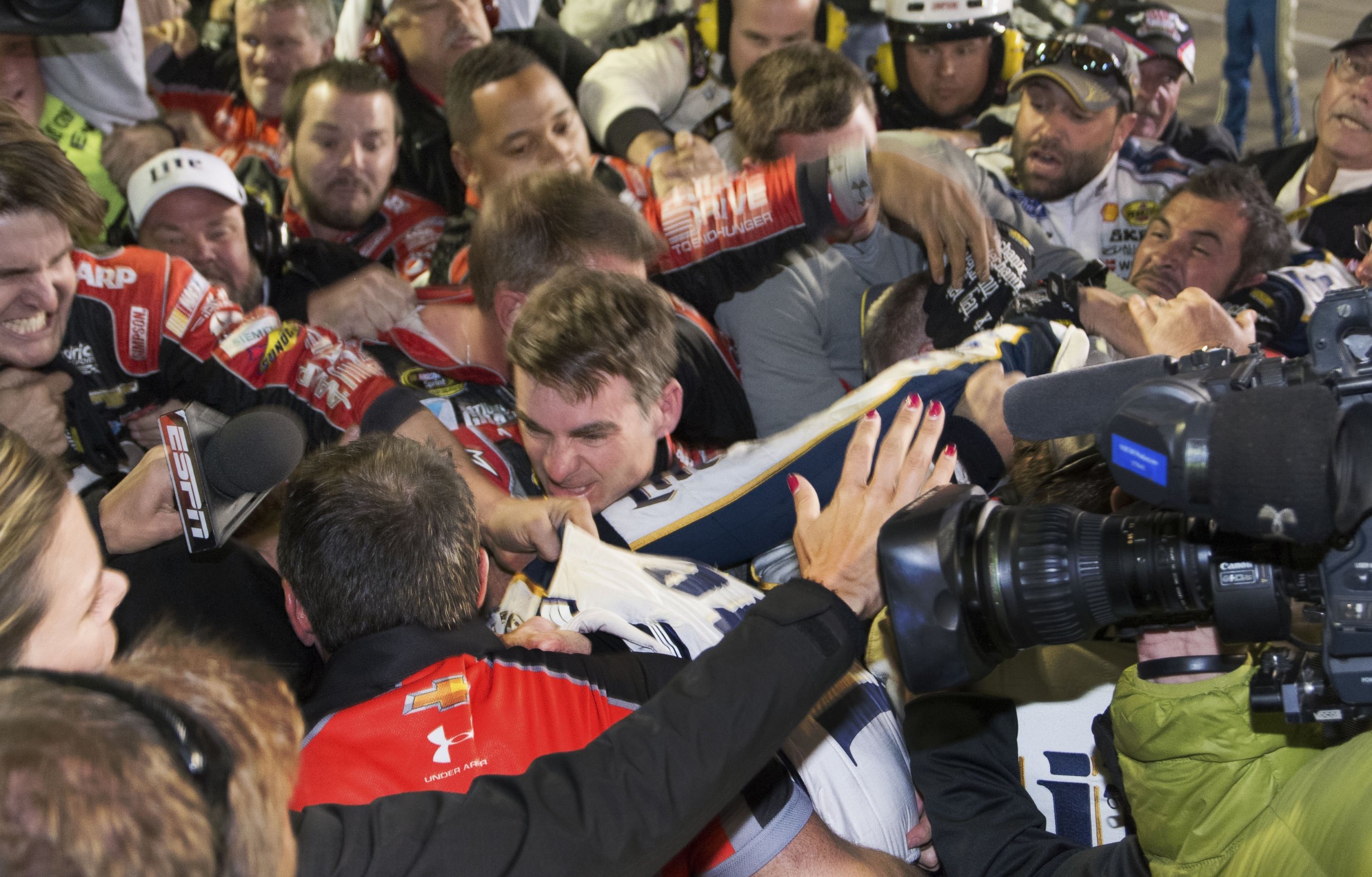 PHOTO: Jeff Gordon is in the middle of a fight after the NASCAR Sprint Cup Series auto race at Texas Motor Speedway in Fort Worth, Texas, Nov. 2, 2014. 