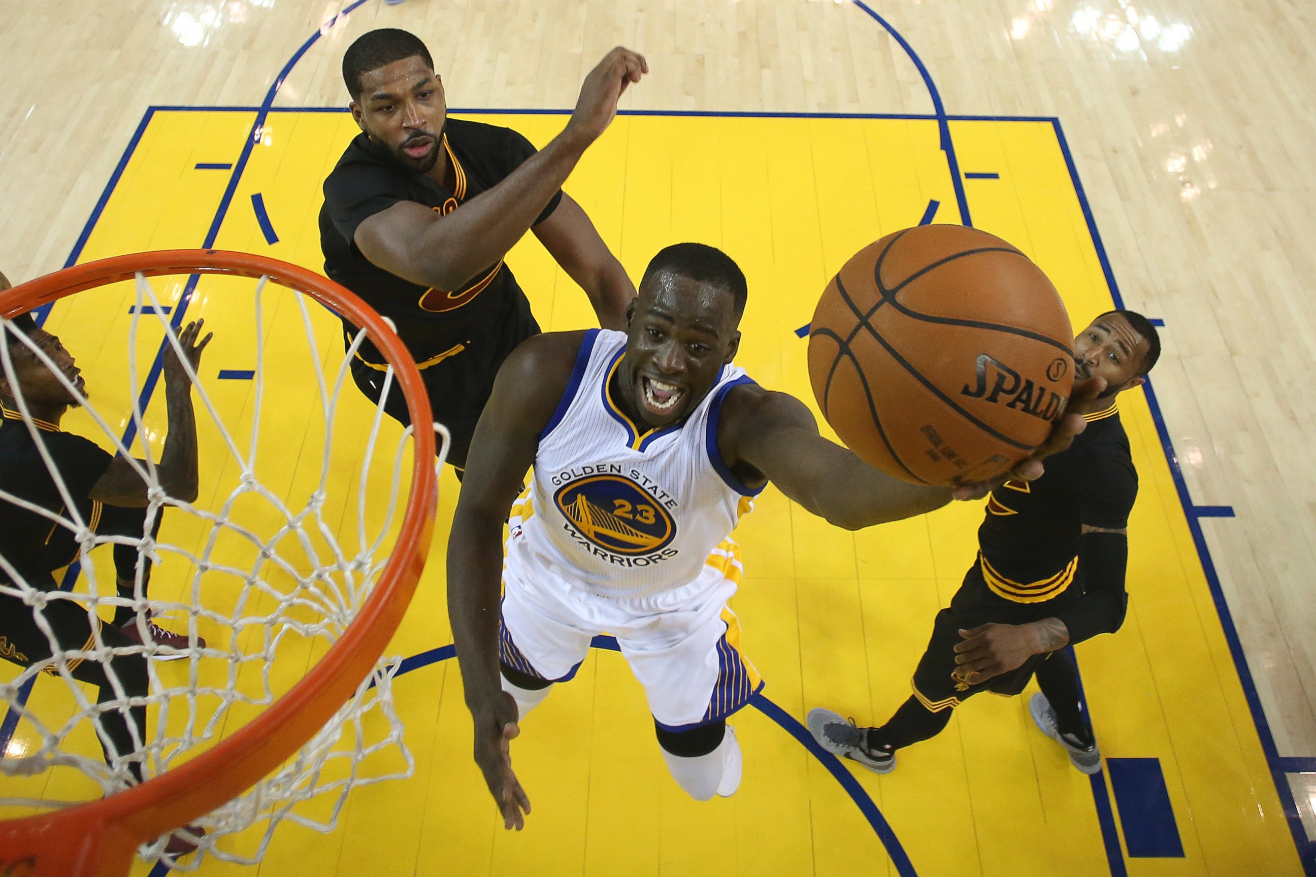 PHOTO: Golden State Warriors forward Draymond Green (23) shoots against the Cleveland Cavaliers during the first half of Game 7 of basketball's NBA Finals in Oakland, Calif., Sunday, June 19, 2016.