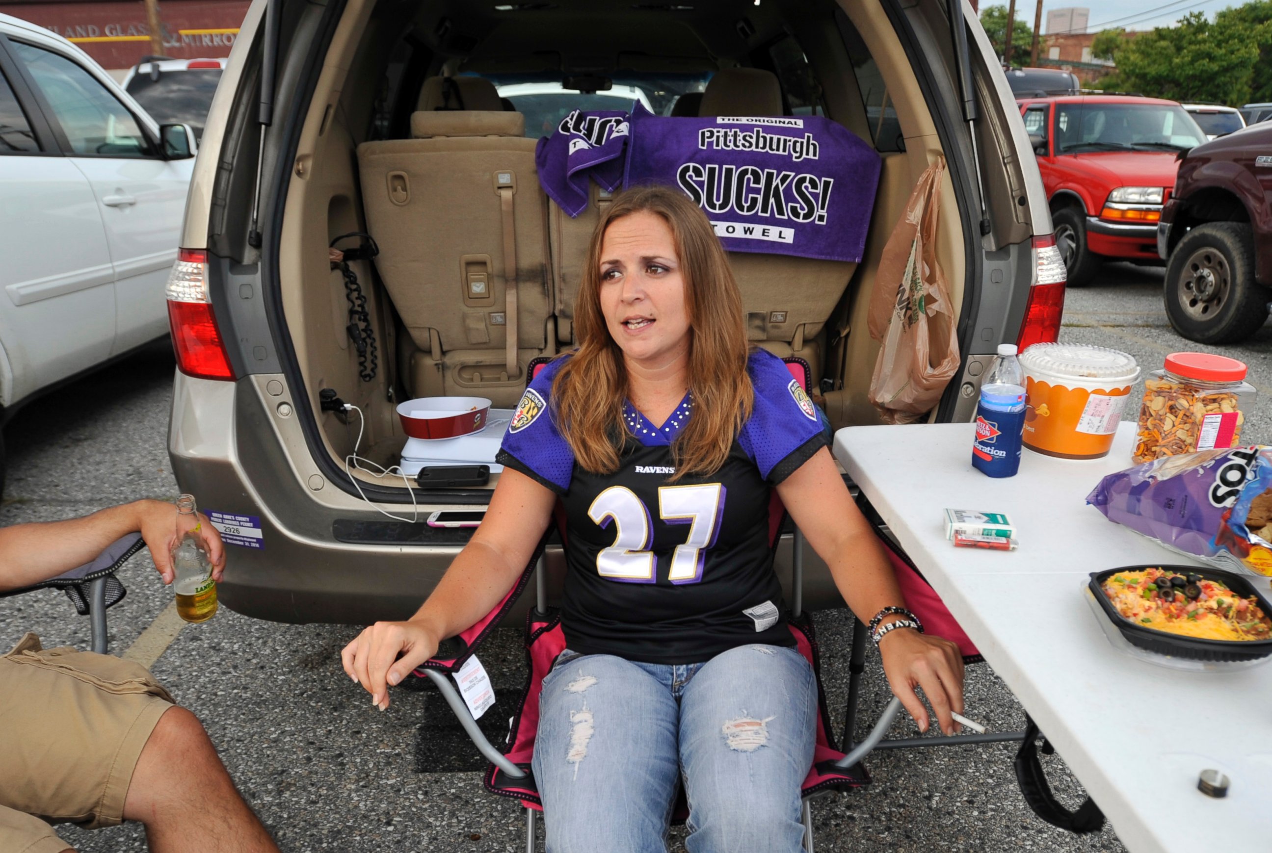 PHOTO: Holly Laucht, from Kent Island, Md., wears a Baltimore Ravens' Ray Rice jersey as she tailgates before the Ravens' NFL football game against the Pittsburgh Steelers, Sept. 11, 2014, in Baltimore.