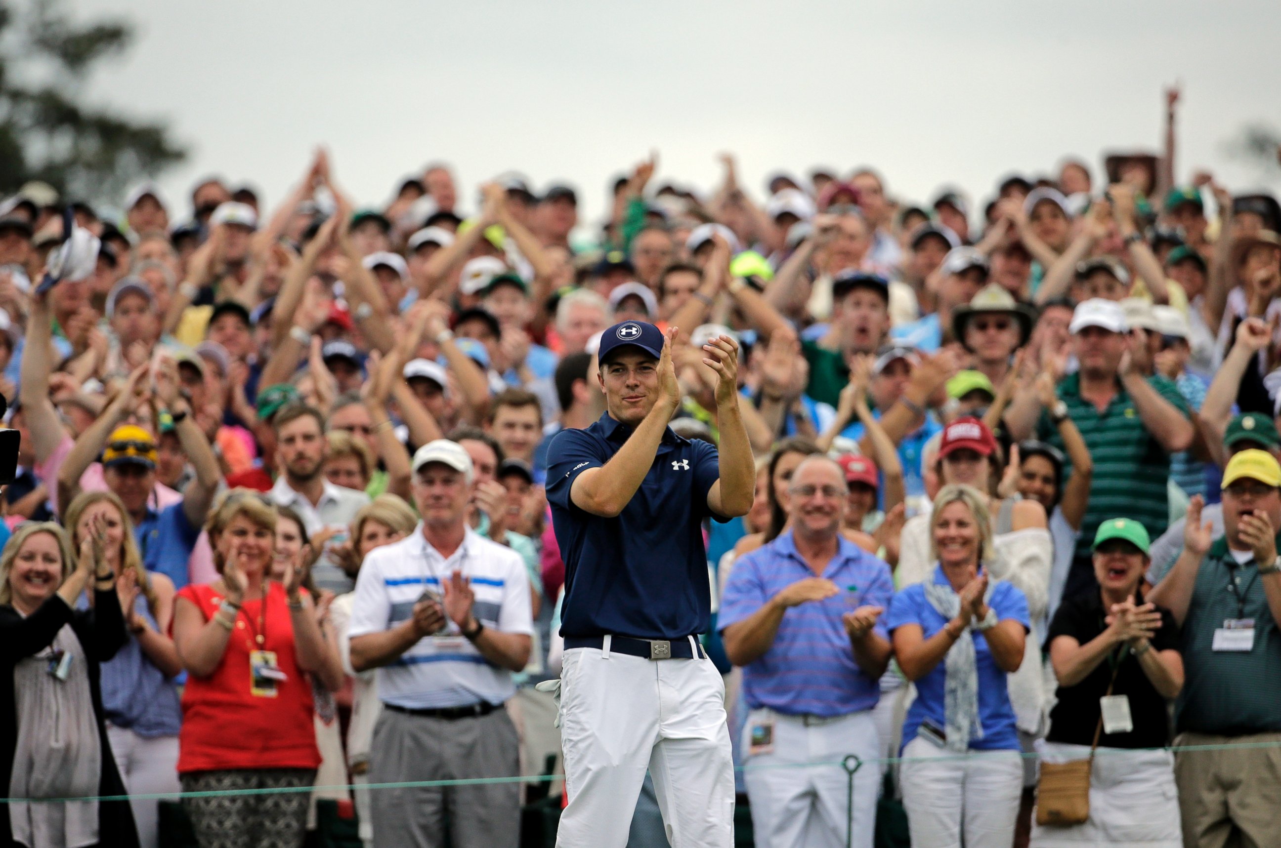 PHOTO: Jordan Spieth applauds after winning the Masters championship during the fourth round of the Masters golf tournament Sunday, April 12, 2015, in Augusta, Ga.