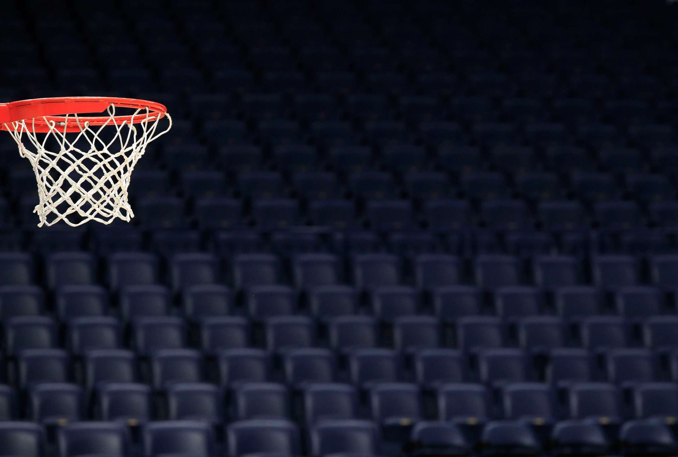 PHOTO: The basket and the arena sit unused after the announcement of the cancellation of the SEC Basketball Tournament at Bridgestone Arena on March 12, 2020 in Nashville, Tenn.
