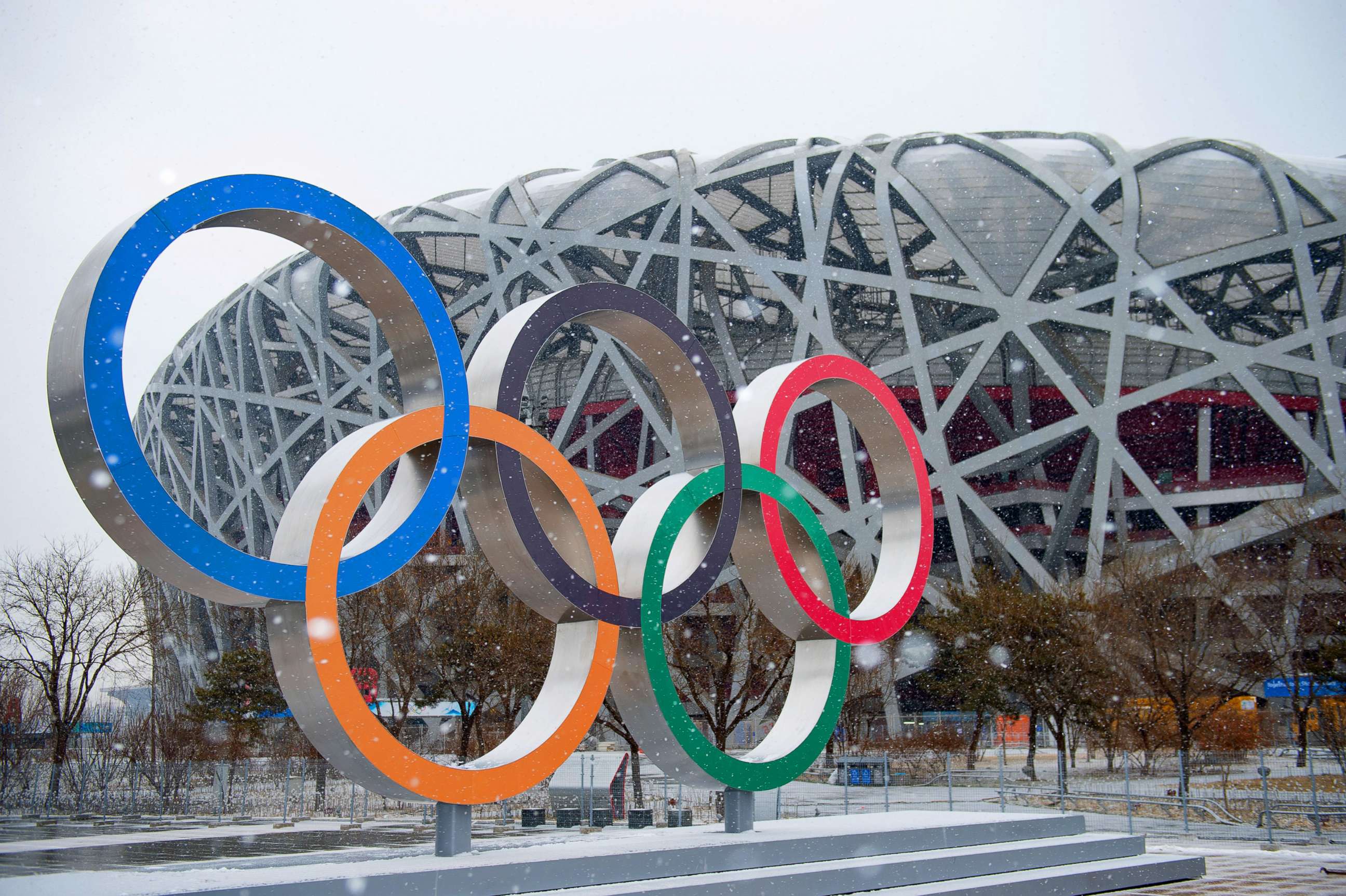 PHOTO: The Olympic rings and the National Stadium are pictured amid snowfall on Jan. 20, 2022 in Beijing.
