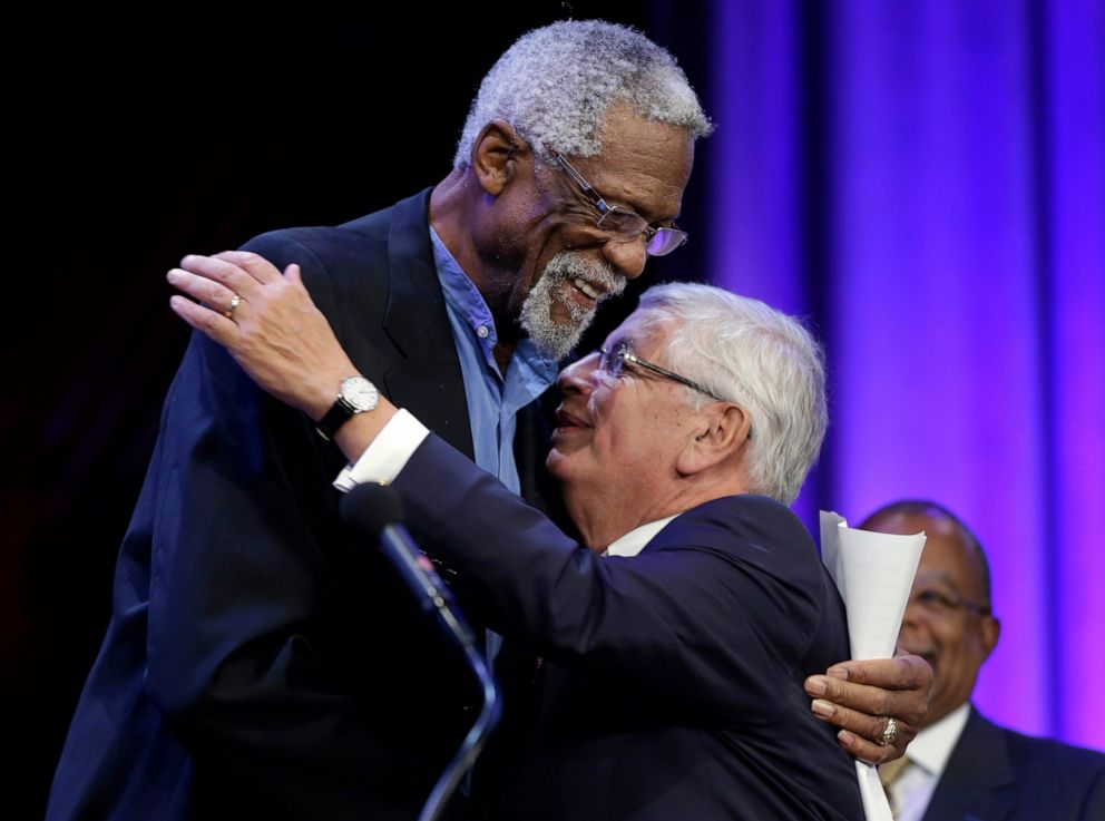 PHOTO: In this Wednesday, Oct. 2, 2013 file photo, Former Boston Celtics basketball player Bill Russell, left, hugs NBA Commissioner David Stern during an award ceremony for the W.E.B. Du Bois Medal at Harvard University, in Cambridge, Mass.