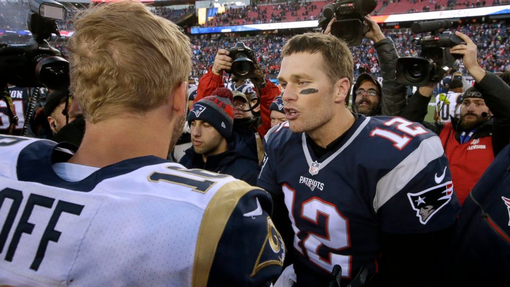 PHOTO: In this Dec. 4, 2016, file photo, New England Patriots quarterback Tom Brady right, speak at midfield to Los Angeles Rams quarterback Jared Goff after the Patriots won 26-10 in an NFL football game in Foxborough, Mass. 