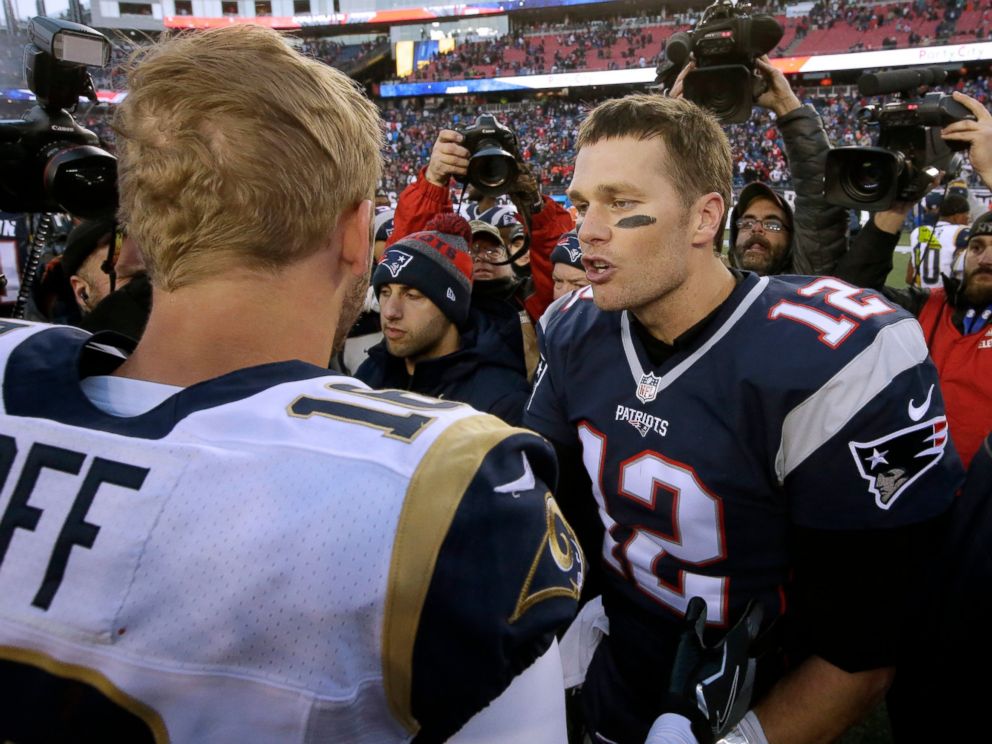 PHOTO: In this Dec. 4, 2016, file photo, New England Patriots quarterback Tom Brady right, speak at midfield to Los Angeles Rams quarterback Jared Goff after the Patriots won 26-10 in an NFL football game in Foxborough, Mass.