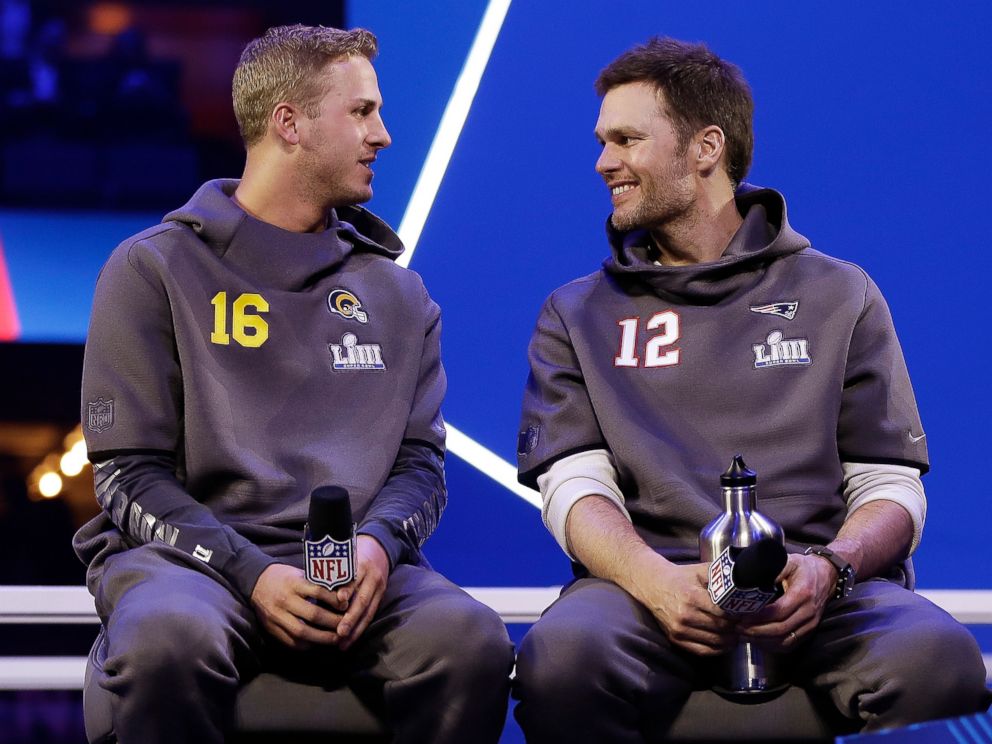 PHOTO: In this Monday, Jan. 28, 2019, file photo, Los Angeles Rams Jared Goff talks to New England Patriots Tom Brady during Opening Night for the NFL Super Bowl 53 football game in Atlanta.