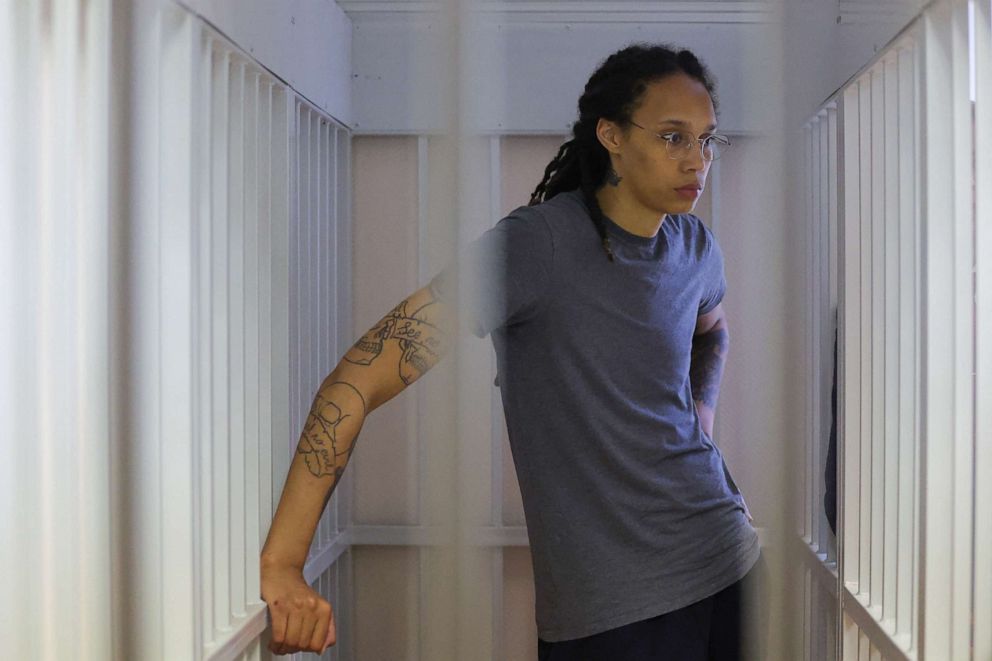 PHOTO: U.S. basketball player Brittney Griner, charged with illegal possession of cannabis, stands inside a defendants' cage before the court's verdict in Khimki outside Moscow, Russia on August 4, 2022.