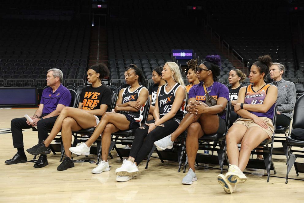 PHOTO: Players, coach and general manager from the Phoenix Mercury attend a rally to support the release of detained American professional athlete Brittney Griner at Footprint Center on July 06, 2022 in Phoenix.