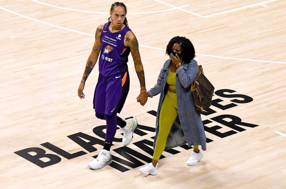 PHOTO: Brittney Griner of the Phoenix Mercury walks hand and hand with wife Cherelle in Palmetto, Fla., Aug. 10, 2020. 