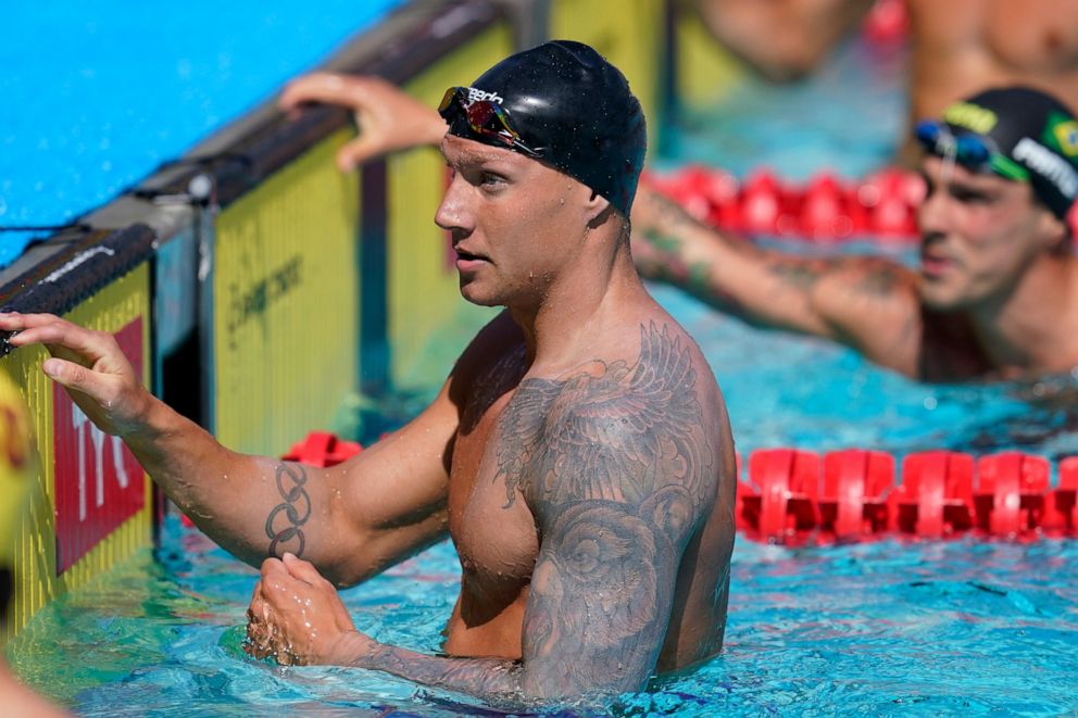 PHOTO: Caeleb Dressel looks at the results after competing in the men's 50-meter freestyle final at the TYR Pro Swim Series swim meet Saturday, April 10, 2021, in Mission Viejo, Calif.