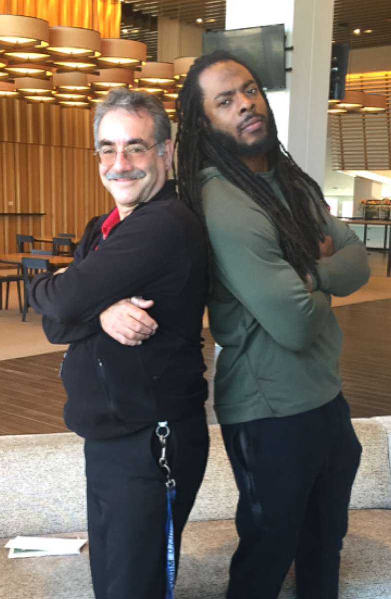 PHOTO: Cabrillo Middle School Principal Stan Garber poses with 49ers Cornerback Richard Sherman. 