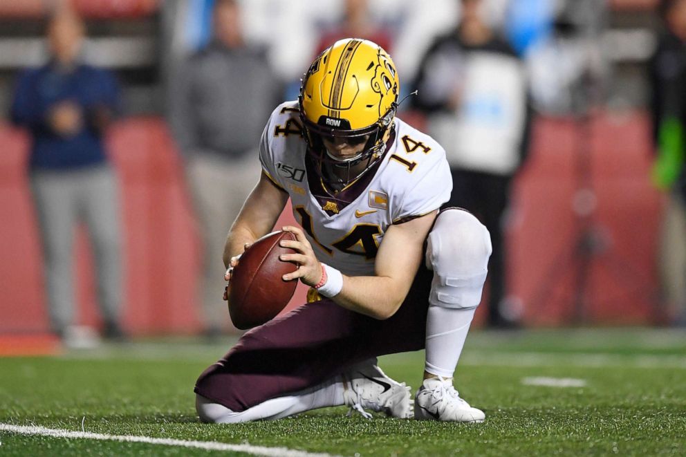 PHOTO: Minnesota Golden Gophers punter Casey O'Brien holds the ball for an extra point kick during the second half of an NCAA college football game against Rutgers Saturday, Oct. 19, 2019, in Piscataway, N.J.