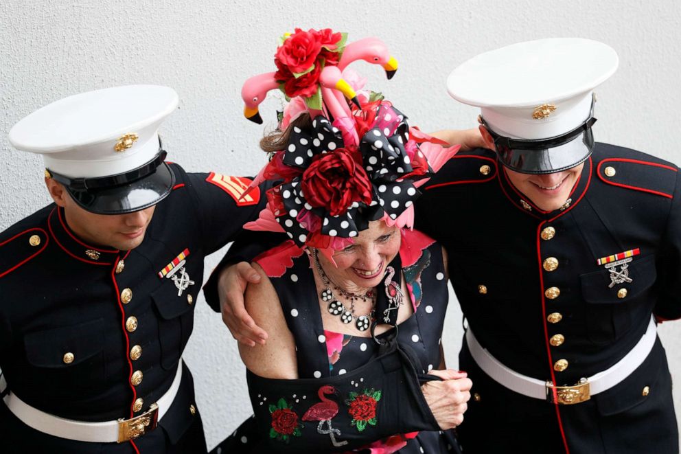 PHOTO: People pose for a picture as they arrive at Churchill Downs before the 145th running of the Kentucky Derby horse race in Louisville, Ky., May 4, 2019.