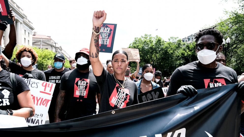 PHOTO: Natasha Cloud marches to the MLK Memorial to support Black Lives Matter and to mark the liberation of slavery, June 19, 2020, in Washington, DC. 