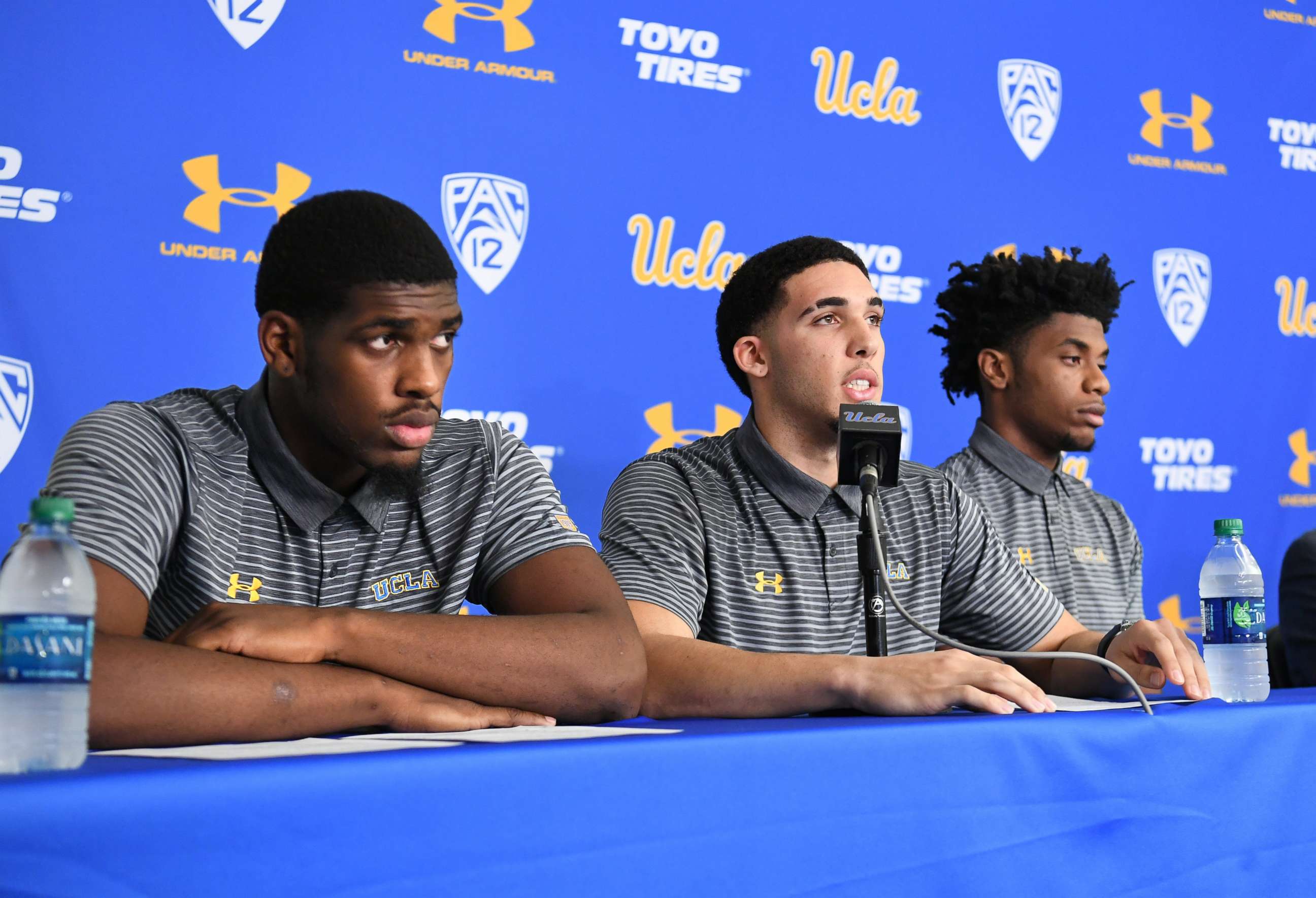 PHOTO: UCLA basketball players (L-R) Cody Riley, LiAngelo Ball and Jalen Hill give statements at Pauley Pavilion about their arrests in China during a press conference, Nov. 15, 2017 in Los Angeles. 