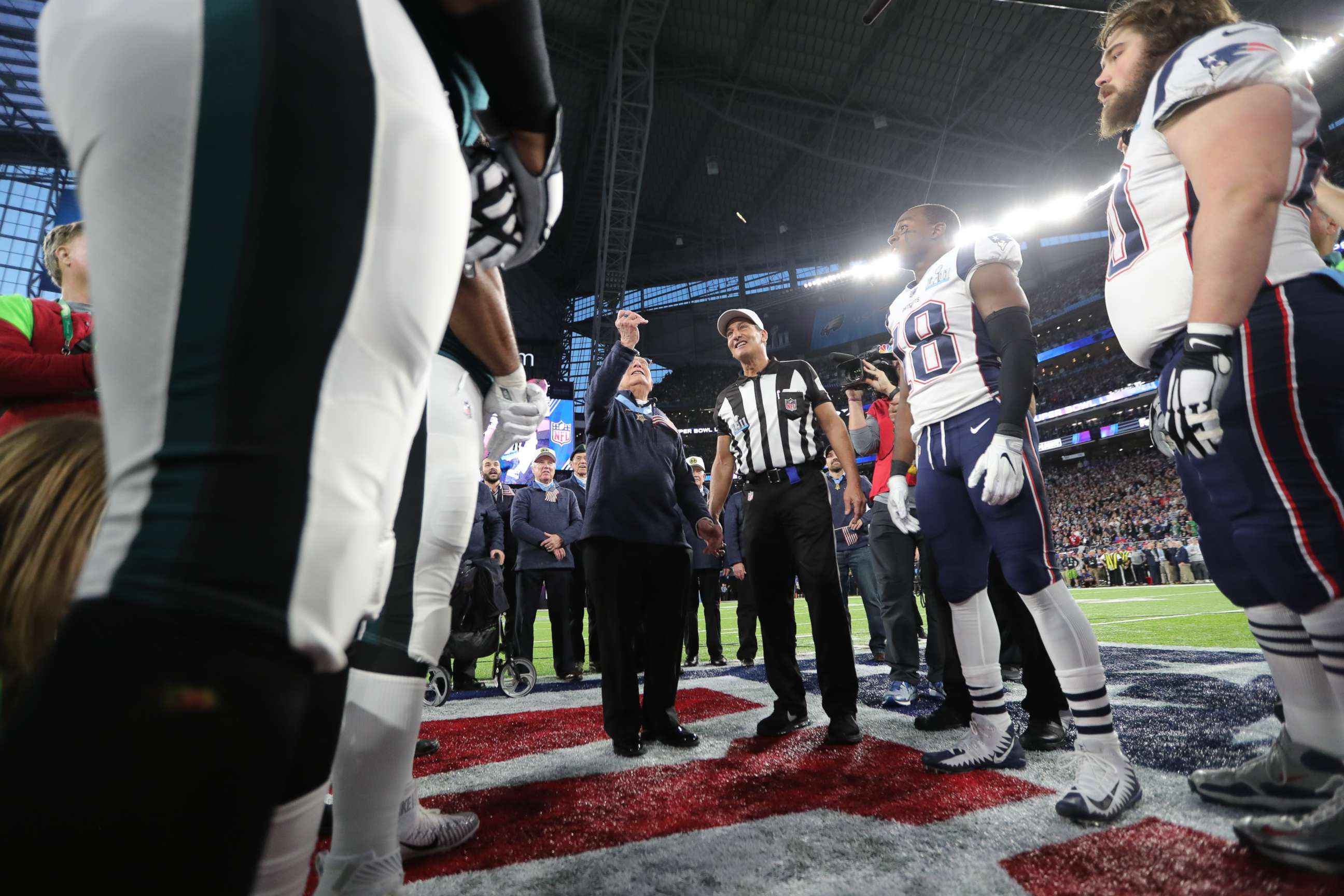 PHOTO: The Philadelphia Eagles and New England Patriots participate in the coin toss prior to the NFL Super Bowl LII football game on Feb. 4, 2018 in Minneapolis.