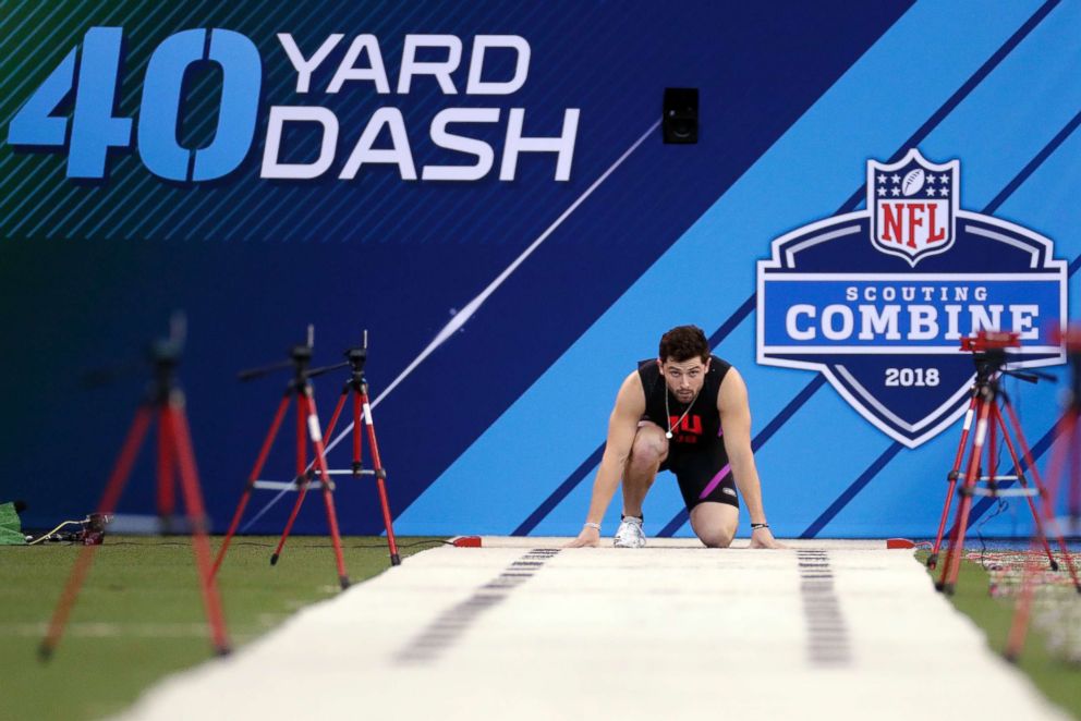 PHOTO: Oklahoma quarterback Baker Mayfield prepares to run the 40-yard dash at the NFL football scouting combine in Indianapolis, March 3, 2018.