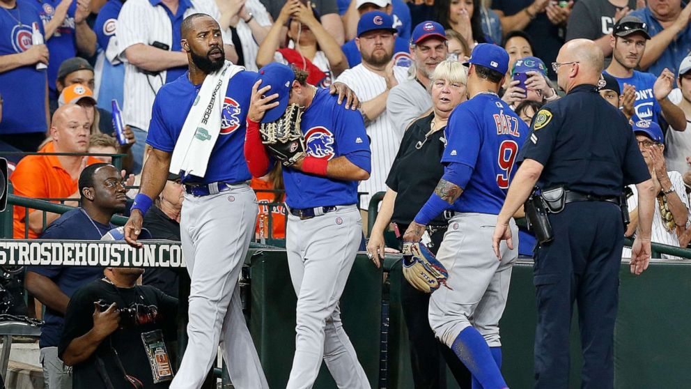 PHOTO: Albert Almora Jr. of the Chicago Cubs is comforted by Jason Heyward after checking on the young child that was injured by a hard foul ball off his bat at Minute Maid Park on May 29, 2019 in Houston, May 29, 2019.