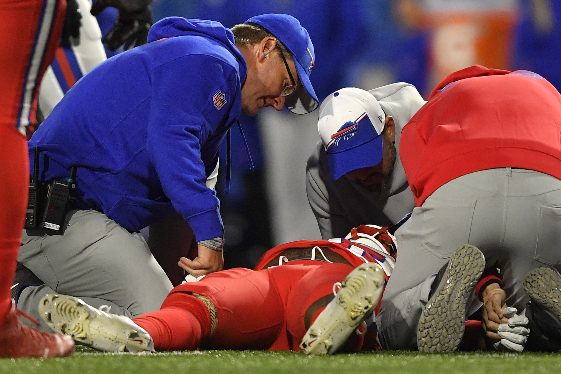 Buffalo Bills running back Damien Harris is attended to by medical staff after taking a hard hit against the New York Giants during the first half of an NFL football game in Orchard Park, N.Y., Sunday, Oct. 15, 2023. (AP Photo/Adrian Kraus)