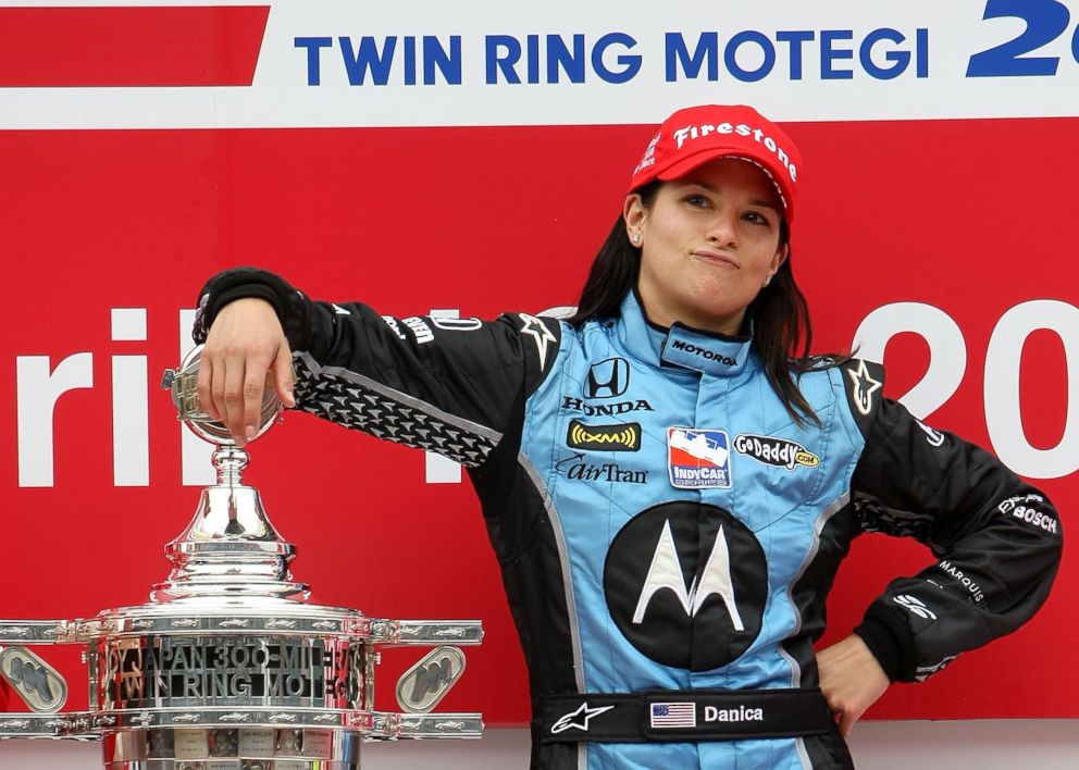 PHOTO: Danica Patrick poses with the trophy after winning the IndyCar Series Bridgestone Indy Japan 300 Mile on April 20, 2008 at Twin Ring Motegi in Motegi, Japan