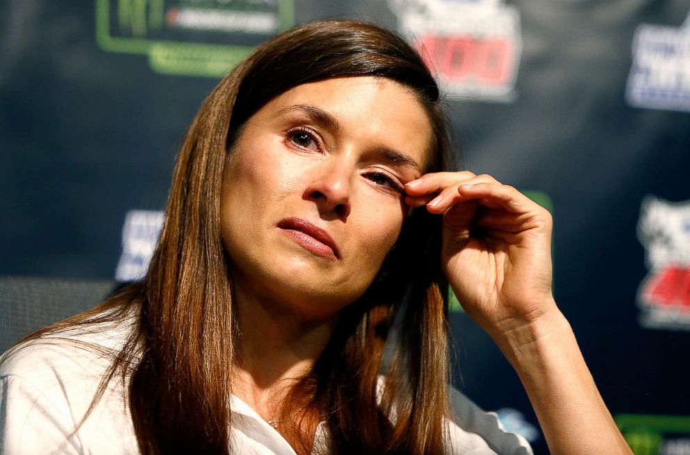 PHOTO: Danica Patrick wipes her face during a press conference announcing her retirement from full-time racing at Homestead-Miami Speedway on Nov. 17, 2017 in Homestead, Fla.