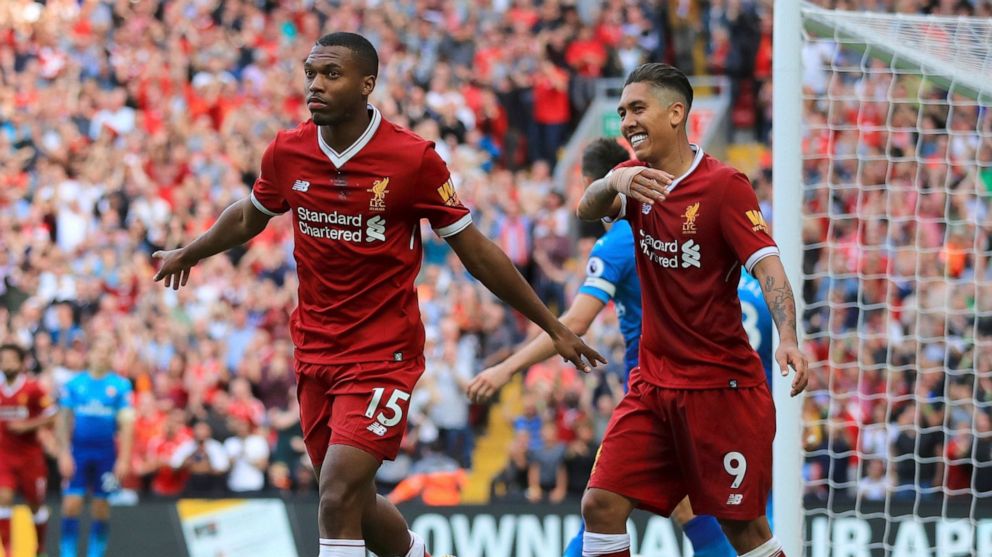 PHOTO: Liverpool's Daniel Sturridge, left, celebrates scoring his side's fourth goal of the game against Arsenal during their English Premier League soccer match at Anfield, Liverpool, England, Sunday Aug. 27, 2017.