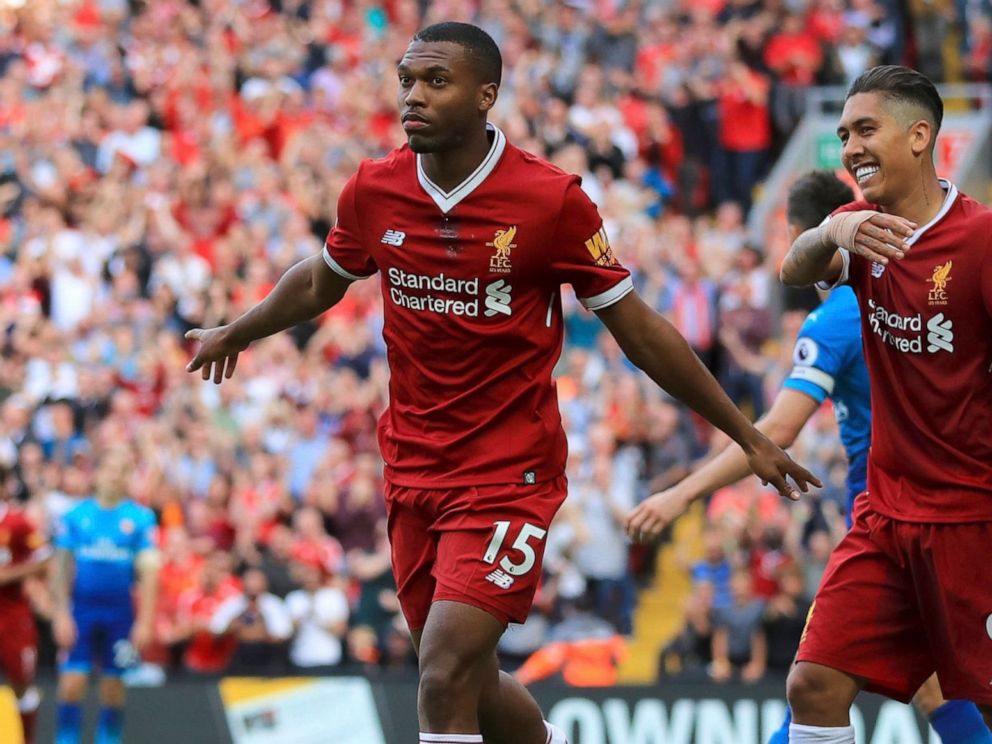 PHOTO: Liverpools Daniel Sturridge, left, celebrates scoring his sides fourth goal of the game against Arsenal during their English Premier League soccer match at Anfield, Liverpool, England, Sunday Aug. 27, 2017.