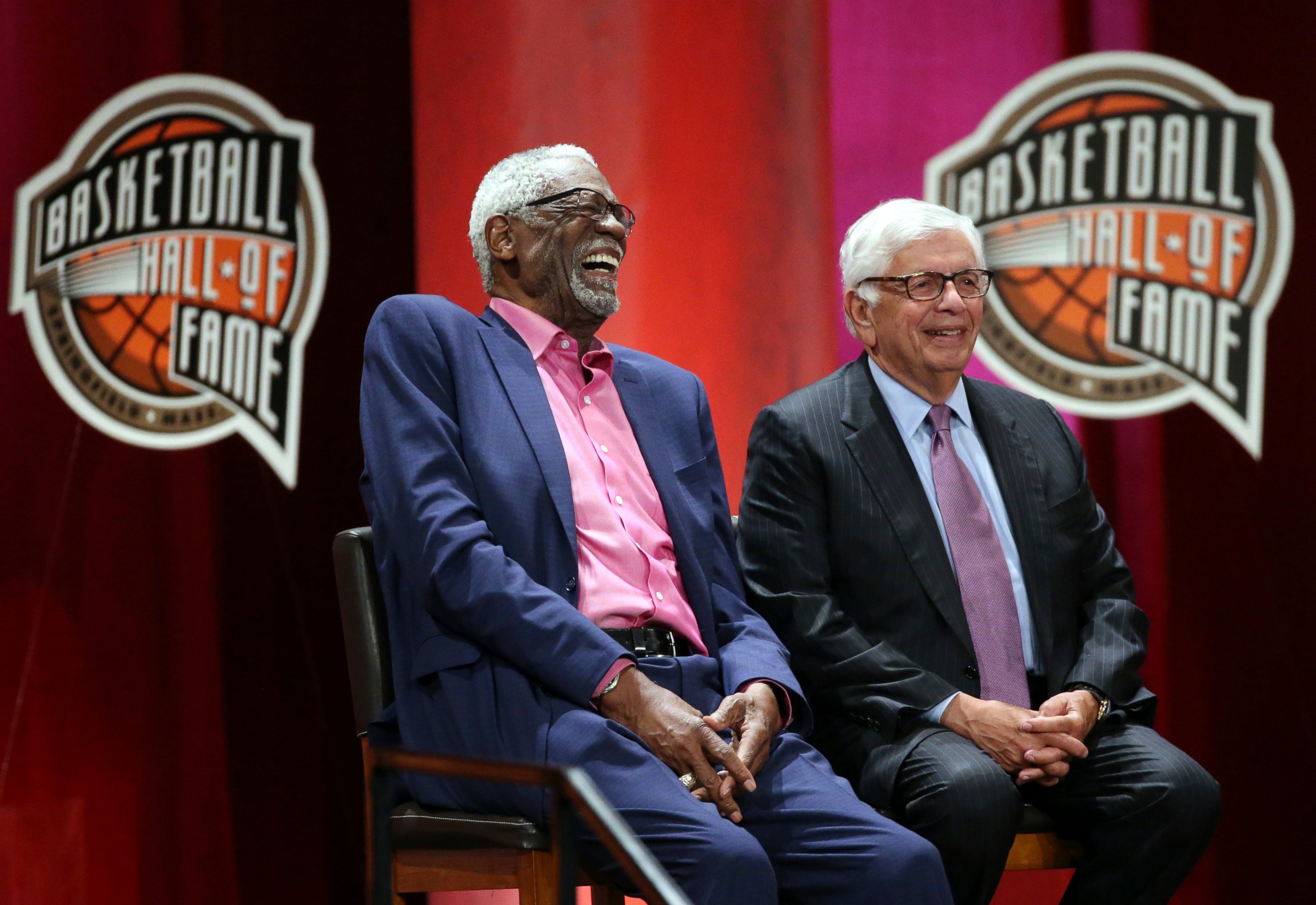 PHOTO: Bill Russell, left, laughs alongside David Stern as they listen to inductee Rick Welts during induction ceremonies into the Basketball Hall of Fame, Friday, Sept. 7, 2018, in Springfield, Mass.