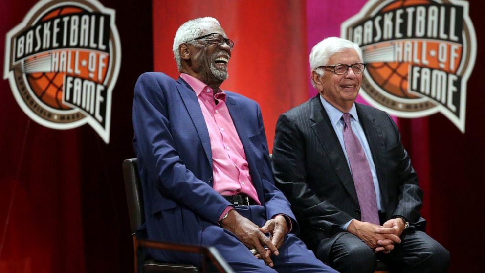 PHOTO: Bill Russell, left, laughs alongside David Stern as they listen to inductee Rick Welts during induction ceremonies into the Basketball Hall of Fame, Friday, Sept. 7, 2018, in Springfield, Mass.