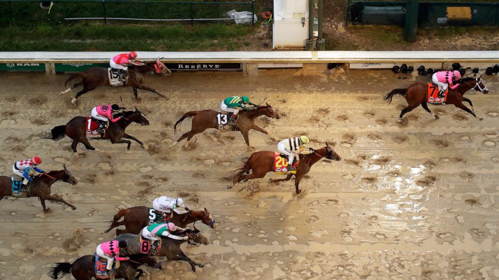 PHOTO: Luis Saez rides Maximum Security across the finish line first followed by Flavien Prat on Country House during the 145th running of the Kentucky Derby at Churchill Downs, May 4, 2019, in Louisville, Ky.