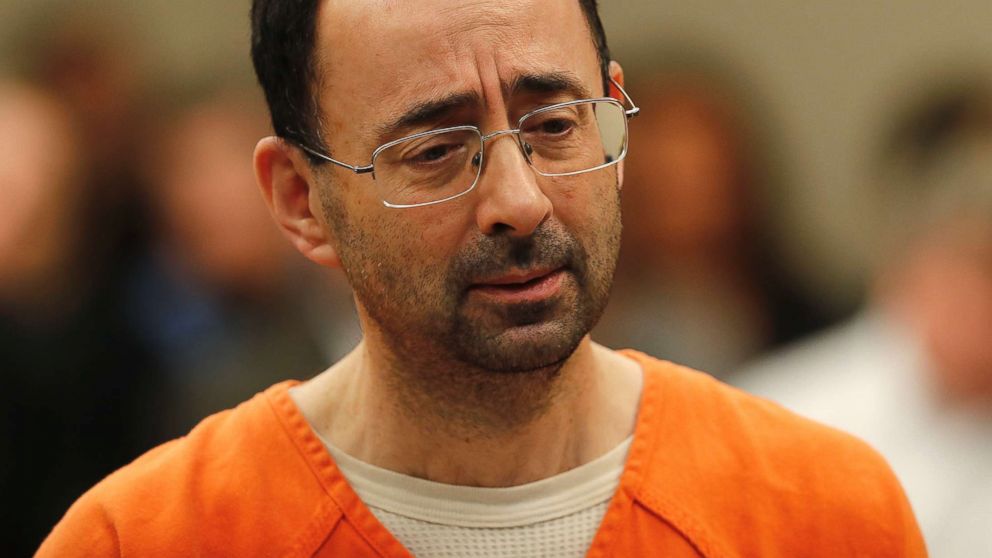 Dr. Larry Nassar, 54, a sports doctor accused of molesting girls while working for USA Gymnastics and Michigan State University, appears in court for a plea hearing in Lansing, Mich., Nov. 22, 2017.