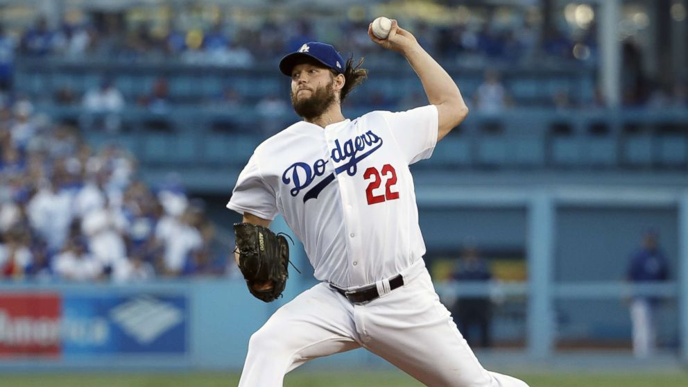 PHOTO: Los Angeles Dodgers starting pitcher Clayton Kershaw throws against the Houston Astros in the top of the first inning of game one of the Major League Baseball (MLB) World Series at Dodger Stadium in Los Angeles, Oct. 24, 2017. 