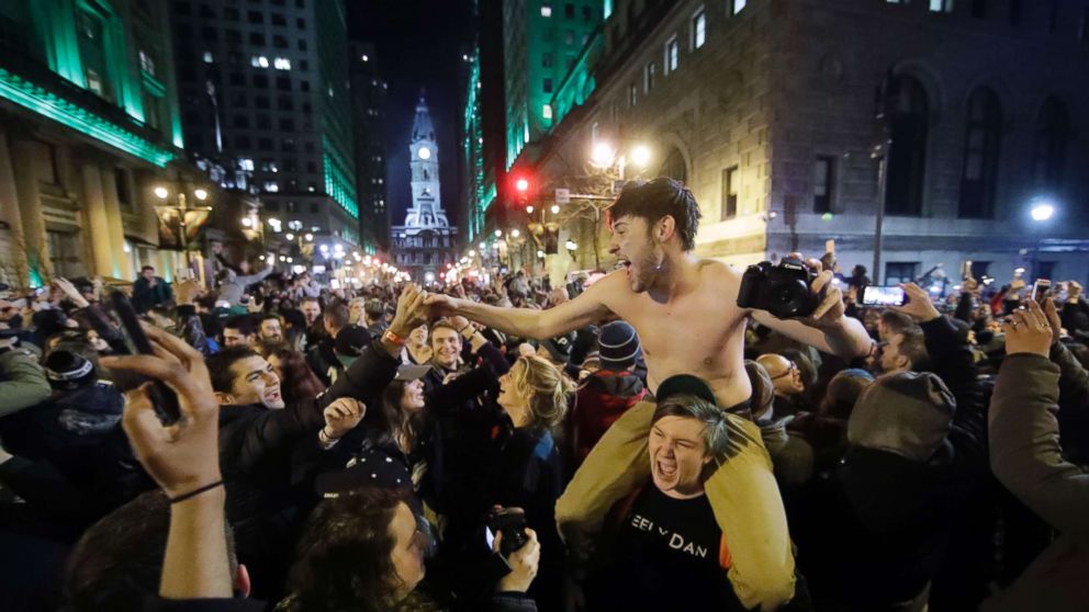 Deliriously drunk Eagles fans overwhelm Philadelphia