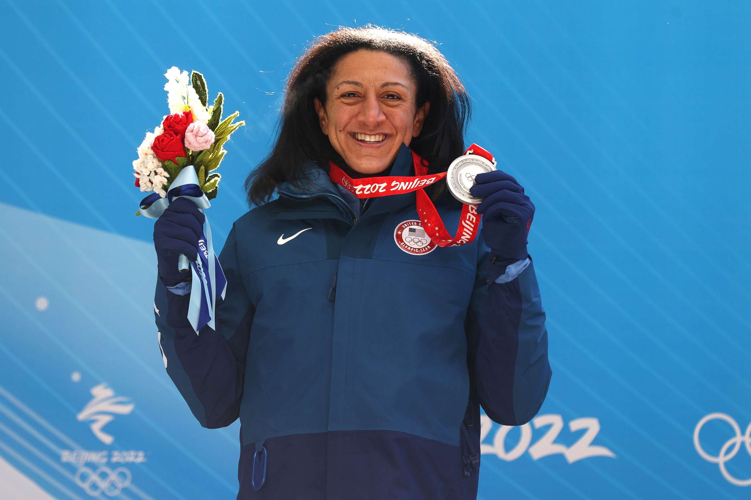 PHOTO: Silver medalist Elana Meyers Taylor of Team U.S. poses during the Women's Monobob Bobsleigh medal ceremony on day 10 of Beijing 2022 Winter Olympic Games at National Sliding Centre, Feb. 14, 2022, in Yanqing, China.