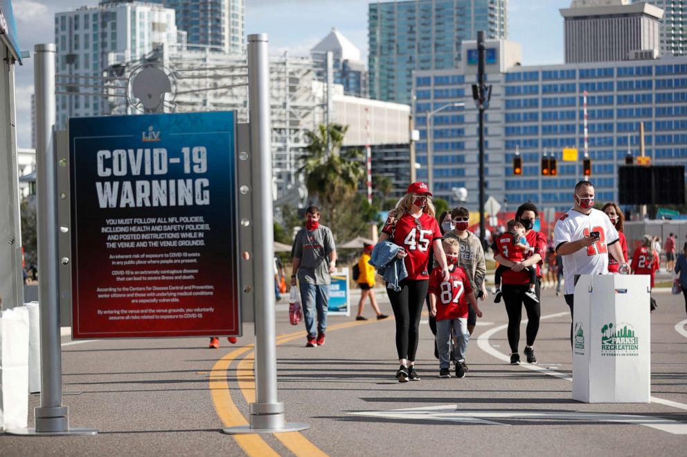 PHOTO: National Football League fans convene in downtown Tampa ahead of Super Bowl 55 during the COVID-19 pandemic, Jan. 30, 2021, in Tampa, Fla.