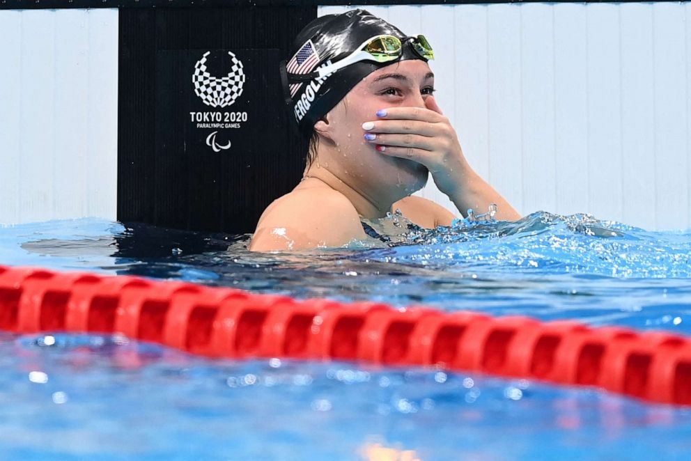 PHOTO: Gia Pergolini of the US celebrates her win in the final of the women's 100-meter backstroke (S13) swimming event at the Tokyo Aquatics Centre during the Tokyo 2020 Paralympic Games in Tokyo on Aug. 26, 2021.