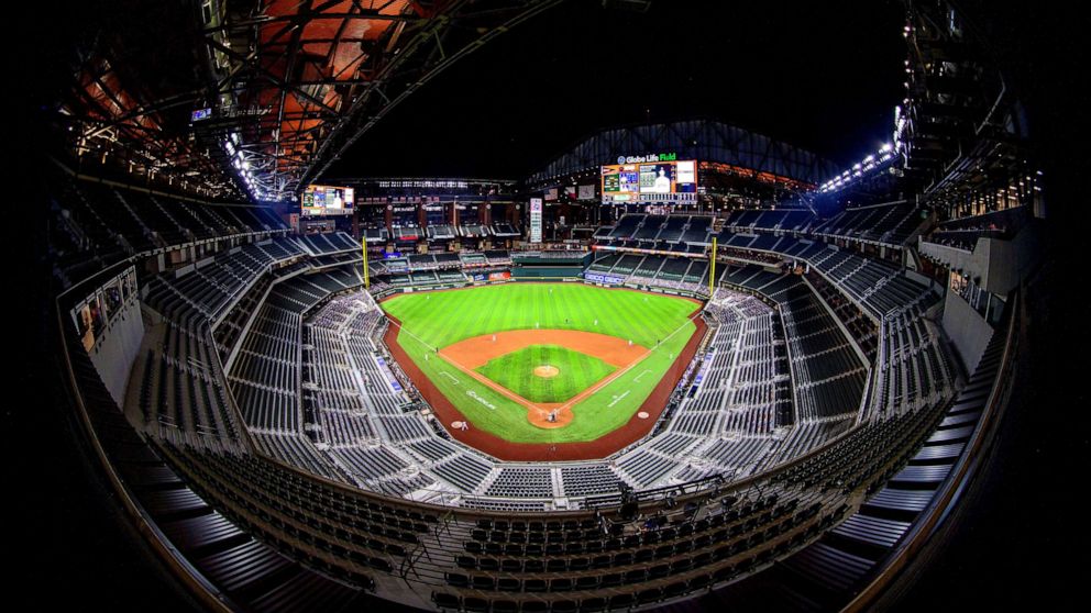 PHOTO: A view of the stands and the open roof during the game between the Texas Rangers and the Houston Astros at Globe Life Field.