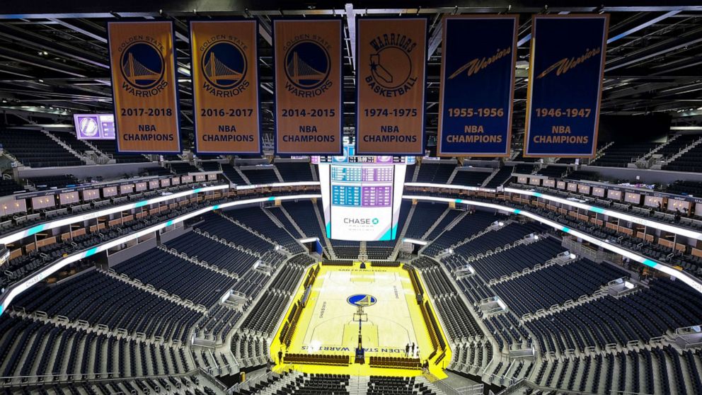 PHOTO: The Golden State Warriors championship banners hang above the seating and basketball court at the Chase Center in San Francisco, Aug. 26, 2019.